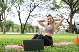 Yoga and relaxation in park, promoting mental well-being. photo