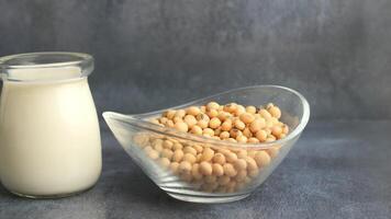 Soybeans and soy milk preparation in a kitchen setting video