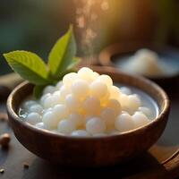 Serving Tapioca Pearls in a Wooden Bowl with Green Leaf photo