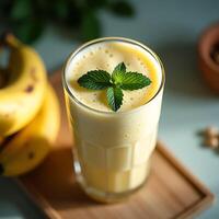 Banana Smoothie with Mint Garnish Refreshing Healthy Drink photo
