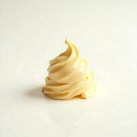 Vanilla Soft Serve Ice Cream Swirl on White Surface photo