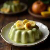 Serving Creamy Pudding with Banana Slices on a Plate photo