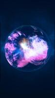 A glowing orb of energy floating in deep blue space, swirling video