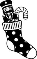 black and white illustration of a Christmas stocking with a nutcracker inside vector