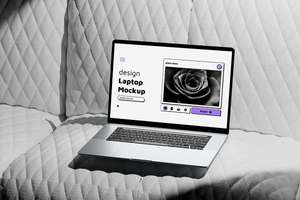 Laptop Mockup on a Couch with Interface Display psd