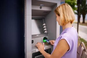 Enjoying summer in Greece while using a convenient ATM photo