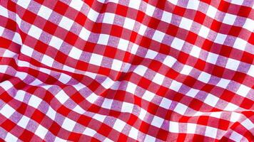 Red and white checkered fabric texture with wavy pattern close up photo