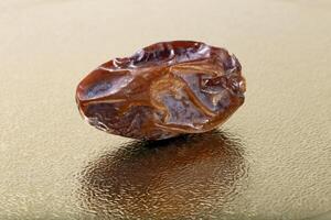 fresh date close up on tray background photo