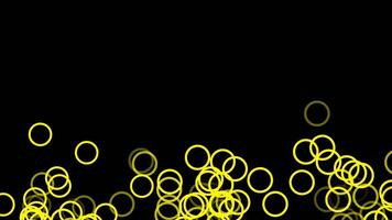 Flying yellow bubble circles animation on black background with copy space. video