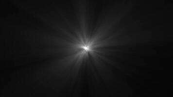 Optical lens flares white rays transition on black background. burst light. video