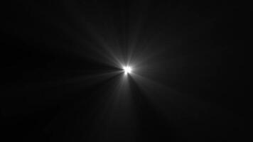 Optical lens flares white rays transition on black background. white spotlight effects. video