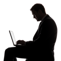 Silhouette of a Man in a Suit Using a Laptop, Shadow Isolated Against a Transparent Background png