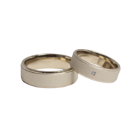 elegante ouro Casamento bandas com fosco terminar, 1 apresentando pequeno diamante, simbolizar amor e compromisso. perfeito para casais procurando Eterno e sofisticado joalheria png