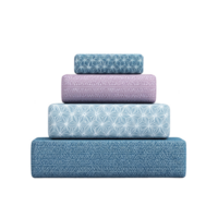 Stack of four rectangular cushions in varying sizes and colors, featuring intricate geometric patterns. cushions are arranged from largest to smallest, with blue, light blue, and purple hues png