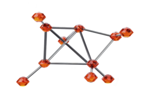 Geometric structure made of interconnected metal rods and orange crystal like nodes, resembling molecular model or abstract sculpture png