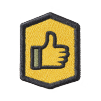 Yellow embroidered patch features black outline of thumbs up symbol, set within hexagonal shape. patch has black border, giving it bold and striking appearance png