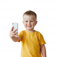 Cheerful young boy smiling while taking a selfie with a smartphone, dressed in a bright yellow shirt, isolated on a white background. png