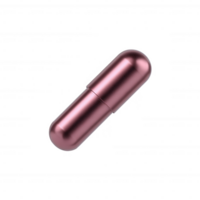 Close-up of a beautiful pink metallic capsule on a reflective surface, showcasing its shiny exterior and sleek design, perfect for health and wellness themes. png