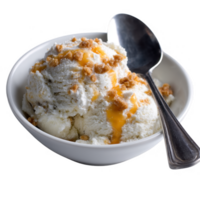 Delicious bowl of vanilla ice cream topped with caramel sauce and crushed nuts, served with a spoon, on a white background. png