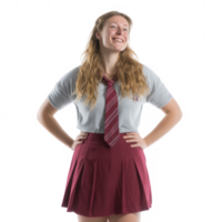A cheerful young student wearing a school uniform with a shirt, tie, and skirt. She stands confidently with hands on hips, smiling against a white isolated background. png