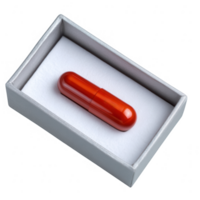 A vibrant red capsule placed inside a gray box, isolated on a white background, symbolizing medication and health care. png