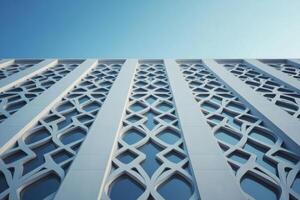 Modern Architectural Design Geometric Facade with Intricate White Pattern and Blue Windows. A Stunning Contemporary Building Exterior, Urban Cityscape, Architectural Details, and Geometric Shapes. photo