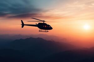 Majestic Helicopter Soaring Above a Breathtaking Mountain Range at Sunrise photo