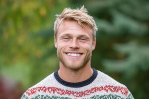 Smiling Man in a Patterned Sweater photo