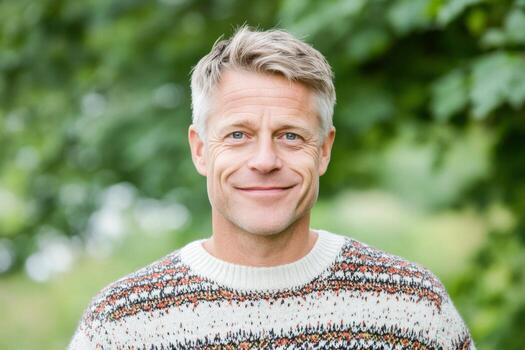 Portrait of a Smiling Man in a Cozy Sweater photo
