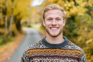 Smiling Man in Autumn Sweater photo