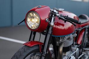 of a stunning red custom motorcycle, showcasing its classic design and powerful engine. A captivating display of modern craftsmans photo