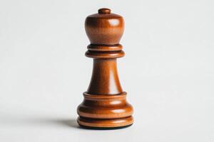 A Captivating Chess Bishop A Masterpiece of Strategy and Skill. This meticulously crafted wooden chess piece exudes timeless elega photo