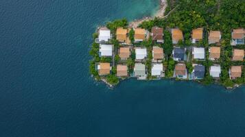 Luxury Waterfront Homes An Aerial View of an Exclusive Coastal Community. Discover the epitome of refined living in this breathtak photo