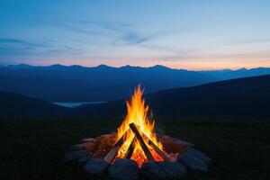 Campfire Under the Starlit Sky A Majestic Mountain Landscape at Sunset. Embark on a visual journey of serenity, tranquility, and t photo