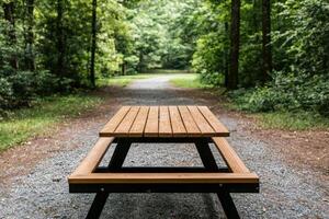 Wooden Picnic Table on a Forest Trail A Serene Escape in Nature photo