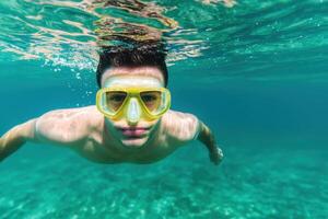 Underwater Snorkeling Adventure A Man Explores the Crystal Clear Ocean Depths on a Sunny Day. Experience the thrill of underwater photo