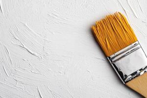 of a paintbrush on a white textured canvas, showcasing the artistry and texture of the paint strokes. This image is perfect for re photo
