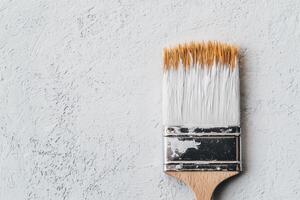 White Paintbrush on Textured Surface A View of Artistic Tools and Techniques for DIY Home Decor and Creative Projects. Perfect fo photo