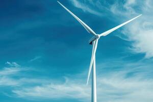 Majestic Wind Turbine Against a Vivid Blue Sky A Symbol of Clean, Renewable Energy and Sustainable Future. Harnessing the Power of photo