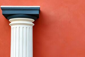 Classical Column against a Red Wall Architectural Detail and Geometric Design. A study in contrast and texture, showcasing the ele photo