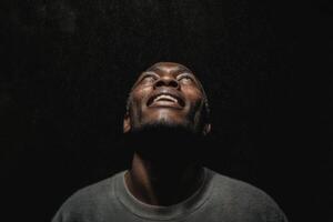 A Moment of Hope A Captivating Portrait of a Man Gazing Upward, Filled with Dreams and Aspiration. His Face Radiates Serenity, Ref photo