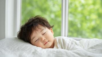 Sweet Dreams A Precious Baby Sleeping Peacefully by the Window, Bathed in Soft Sunlight. A Tender Moment of Tranquility and Innoce photo