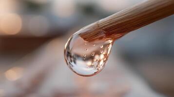 of a Transparent Liquid Drop, Showing its Texture and Consistency. A Macro Photograph of a Viscous Substance, Perfect for Science photo