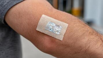 Innovative Medical Sensor Patch A Glimpse into the Future of Healthcare. This advanced wearable technology seamlessly integrates w photo