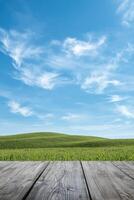 Sky view, green hill landscape behind a wooden patio, for nature stock uses photo