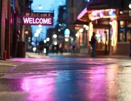 Evening urban welcome scene with neon light reflecting on the wet pavement photo