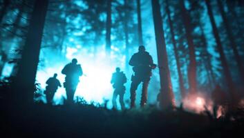 Military unit patrol in dark foggy forest with light. Use recruitment, war film photo