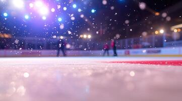 Skating rink with people skating in a city park at night during a snow shower photo