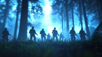Soldiers patrol in the forest at night, potential war or military training use photo