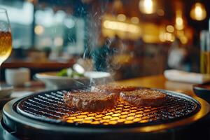 Sizzling steaks on tabletop grill in bustling restaurant, ready for a delicious meal photo